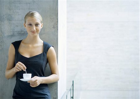 simsearch:632-01157433,k - Woman holding coffee cup, portrait Stock Photo - Premium Royalty-Free, Code: 695-03374266