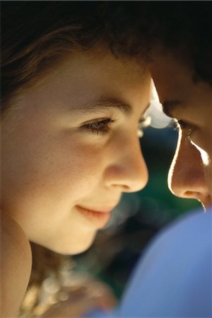 Teenage couple with heads together, close-up Stock Photo - Premium Royalty-Free, Code: 695-03374616