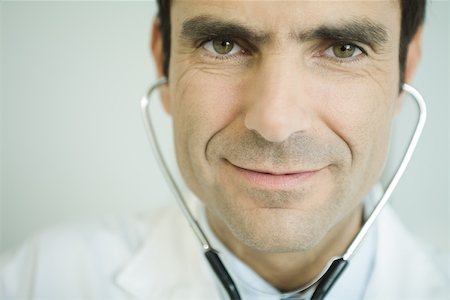 doctor with card - Doctor, portrait Stock Photo - Premium Royalty-Free, Code: 695-03375290