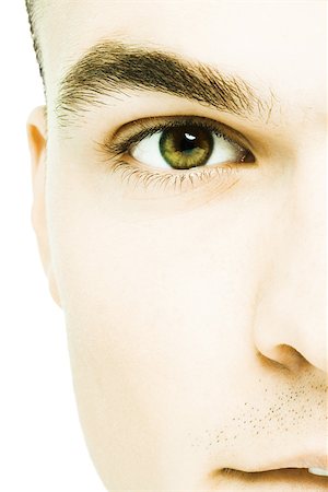 Young man's face, extreme close-up Stock Photo - Premium Royalty-Free, Code: 695-03375587