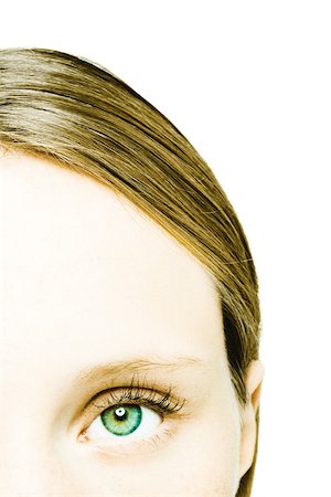 simsearch:695-03375605,k - Teenage girl's face, extreme close-up Foto de stock - Royalty Free Premium, Número: 695-03375596