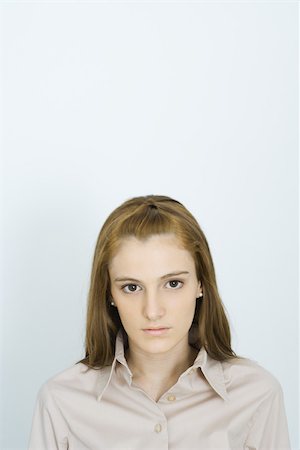 simsearch:696-03393927,k - Young woman, looking at camera, portrait Stock Photo - Premium Royalty-Free, Code: 695-03375795