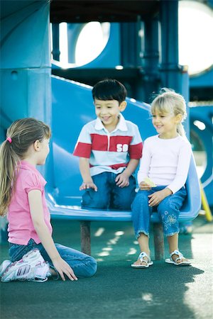 Children on playground equipment Stock Photo - Premium Royalty-Free, Code: 695-03375907
