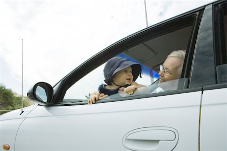 Senior woman and baby in car Stock Photo - Premium Royalty-Free, Code: 695-03375936