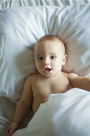 simsearch:632-03847966,k - Baby in bed, waist up Stock Photo - Premium Royalty-Free, Code: 695-03376610