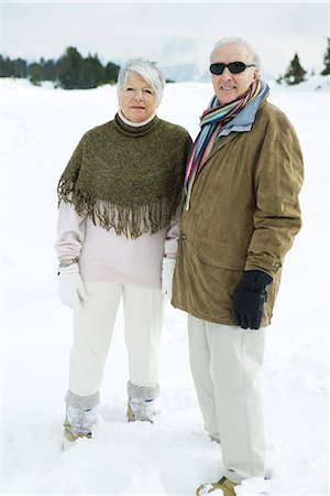 senior man portrait scarf - Senior couple standing side by side outdoors, looking at camera, portrait Stock Photo - Premium Royalty-Free, Code: 695-03376858