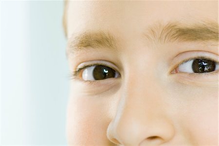 Extreme close-up of boy's eyes and nose Stock Photo - Premium Royalty-Free, Code: 695-03376910