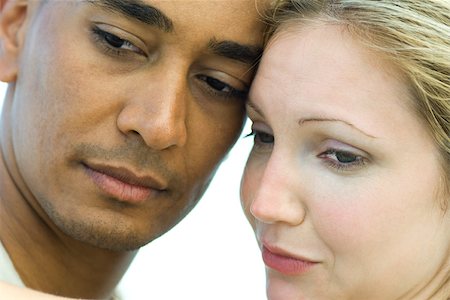 simsearch:696-03402108,k - Couple cheek to cheek, looking away, close-up Stock Photo - Premium Royalty-Free, Code: 695-03377875