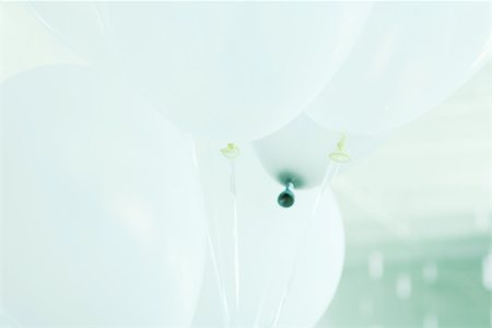 simsearch:633-01715136,k - Balloons tied with ribbon, close-up Fotografie stock - Premium Royalty-Free, Codice: 695-03378653