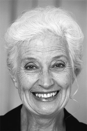 pretty gray hair smiling - Woman smiling at camera, portrait Stock Photo - Premium Royalty-Free, Code: 695-03378719