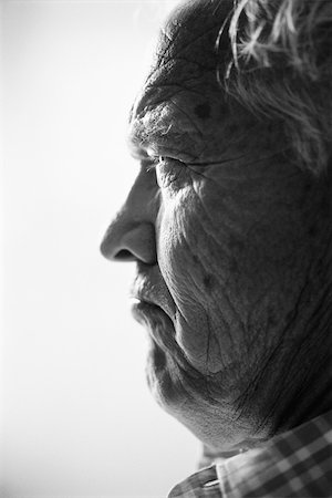 Man frowning, profile, portrait Stock Photo - Premium Royalty-Free, Code: 695-03378720