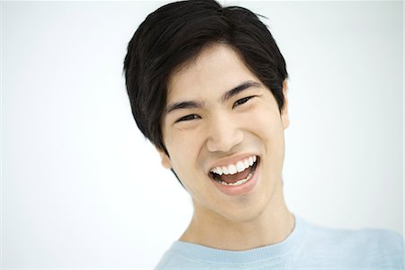 simsearch:695-03380090,k - Young man laughing, portrait Stock Photo - Premium Royalty-Free, Code: 695-03379196