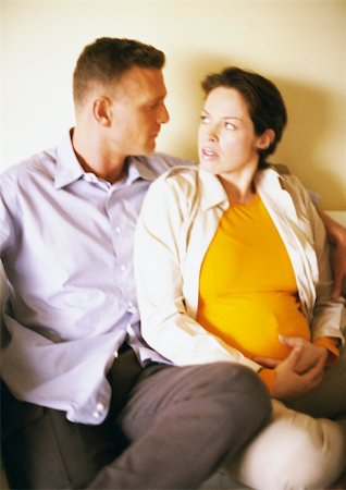 diffuse - Man and pregnant woman sitting and looking at each other Stock Photo - Premium Royalty-Free, Code: 695-03384051