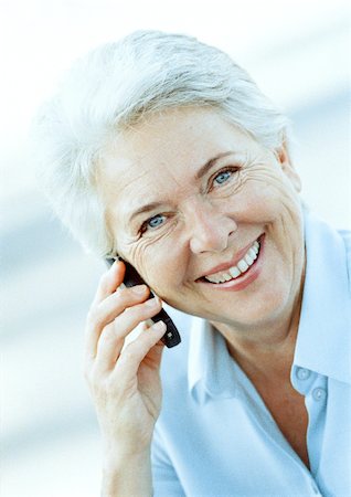 simsearch:693-06019332,k - Mature woman with cell phone, portrait Stock Photo - Premium Royalty-Free, Code: 695-03384107