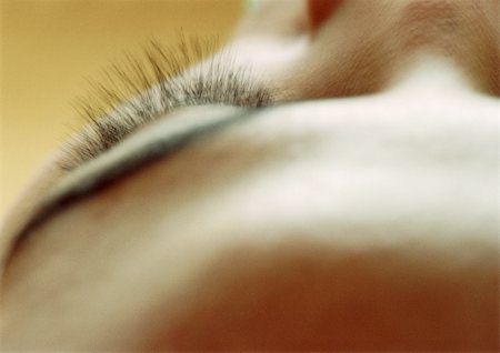 Woman's eyelashes, high angle view, close-up Stock Photo - Premium Royalty-Free, Code: 695-03384203