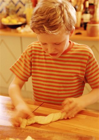 simsearch:695-03384582,k - Child handling pastry dough, blurred motion Stock Photo - Premium Royalty-Free, Code: 695-03384573