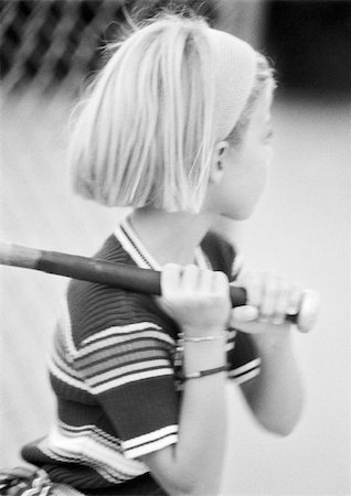 Girl holding baseball bat, b&w Stock Photo - Premium Royalty-Free, Code: 695-03385073