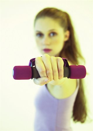 simsearch:695-03375202,k - Woman lifting weights Stock Photo - Premium Royalty-Free, Code: 695-03385550