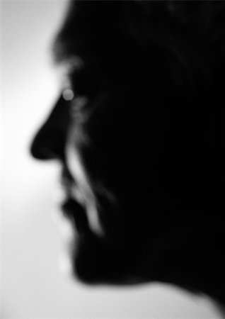 sad face side profile - Senior man, side view, blurred, clseo-up, b&w Stock Photo - Premium Royalty-Free, Code: 695-03385676