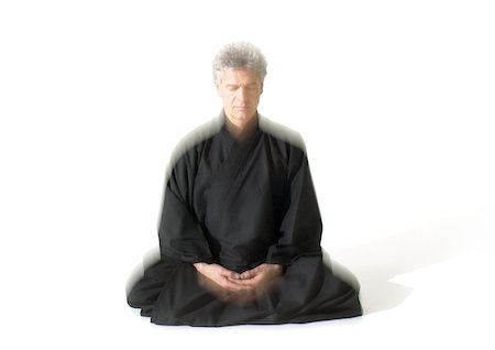 simsearch:695-03385803,k - Man sitting indian style, meditating Stock Photo - Premium Royalty-Free, Code: 695-03385750