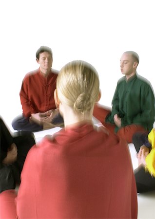 simsearch:695-05776390,k - People sitting on floor, meditating, blurred Foto de stock - Sin royalties Premium, Código: 695-03385789