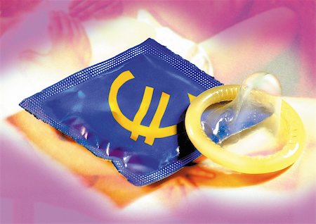 simsearch:695-03386045,k - Euro sign printed on condom wrapper Stock Photo - Premium Royalty-Free, Code: 695-03386036