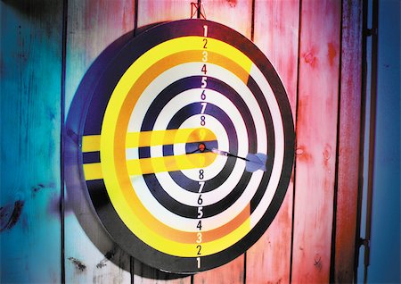 darts and target - Euro sign on dart board. Stock Photo - Premium Royalty-Free, Code: 695-03386039