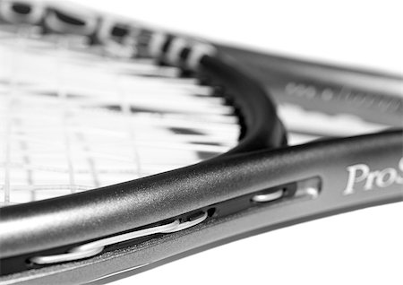 simsearch:614-00380639,k - Tennis racket, close-up, b&w. Fotografie stock - Premium Royalty-Free, Codice: 695-03386214