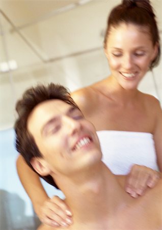 Woman massaging man's shoulders, close-up Stock Photo - Premium Royalty-Free, Code: 695-03386525