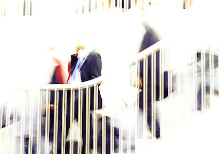 simsearch:695-03382908,k - Businessman on stairs, blurred Fotografie stock - Premium Royalty-Free, Codice: 695-03386783