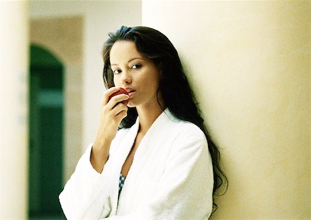 Woman eating apple. Stock Photo - Premium Royalty-Free, Code: 695-03387039