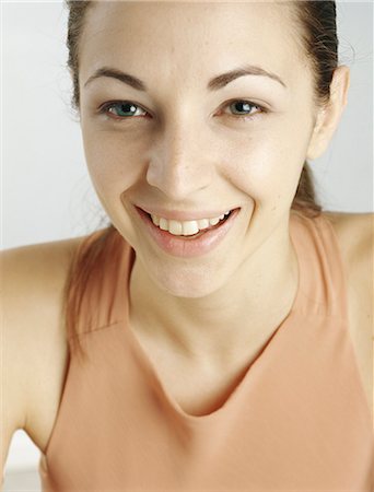 simsearch:695-03390134,k - Woman smiling, close-up Stock Photo - Premium Royalty-Free, Code: 695-03388062