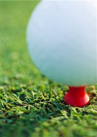 Teed golf ball, extreme close-up Stock Photo - Premium Royalty-Free, Code: 695-03388215