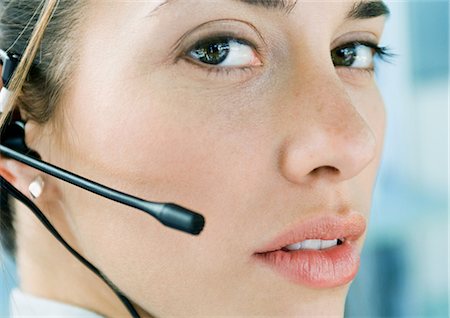 phone operator - Woman wearing headset, close-up Foto de stock - Sin royalties Premium, Código: 695-03388384