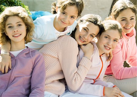 simsearch:632-05553991,k - Group of preteen girls, smiling Stock Photo - Premium Royalty-Free, Code: 695-03388789