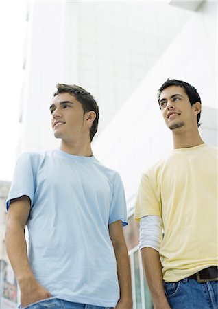 simsearch:695-03374312,k - Two teen boys standing, looking out of frame Foto de stock - Sin royalties Premium, Código: 695-03388854
