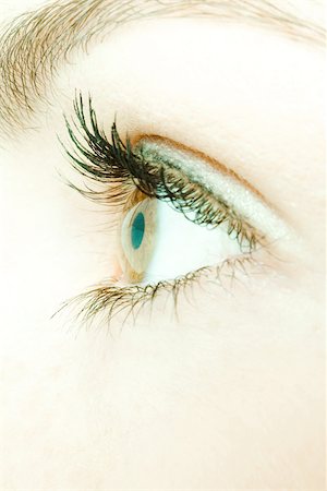 Woman's eye, side view, extreme close-up Foto de stock - Sin royalties Premium, Código: 695-03389137