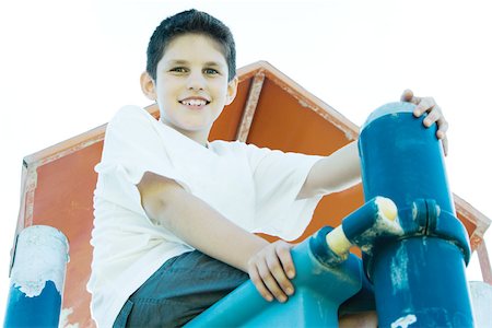 simsearch:695-03373539,k - Boy on playground equipment, smiling at camera Stock Photo - Premium Royalty-Free, Code: 695-03389218