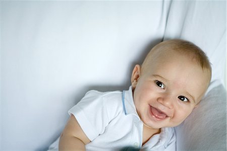 Baby smiling at camera, portrait Stock Photo - Premium Royalty-Free, Code: 695-03389386