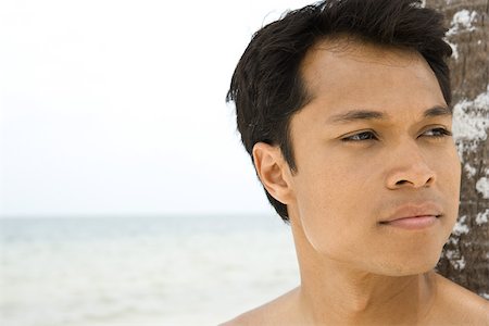simsearch:696-03402108,k - Man at the beach looking away, close-up Stock Photo - Premium Royalty-Free, Code: 695-03389664