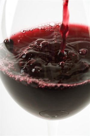 five senses aging - Red wine pouring into glass, close-up Stock Photo - Premium Royalty-Free, Code: 695-03389885