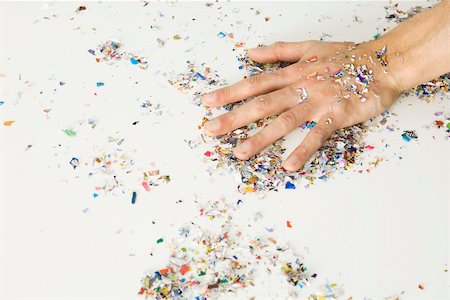 Hand covered with confetti Foto de stock - Sin royalties Premium, Código: 695-03380018