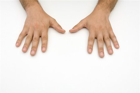 Man's hands, side by side Stock Photo - Premium Royalty-Free, Code: 695-03380025