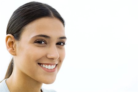 simsearch:633-02066083,k - Young woman smiling at camera, portrait Stock Photo - Premium Royalty-Free, Code: 695-03380605