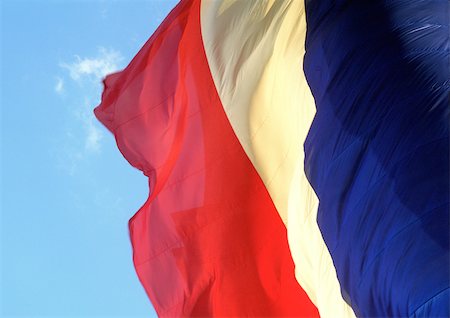 french flag - French flag blowing in winde, close-up Stock Photo - Premium Royalty-Free, Code: 695-03380803