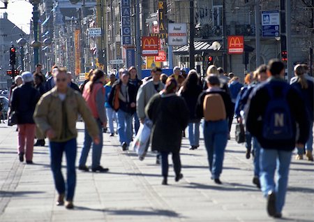 simsearch:695-05773323,k - Crowd, dressed warmly, walking on sidewalk in city, blurred. Stock Photo - Premium Royalty-Free, Code: 695-03380834