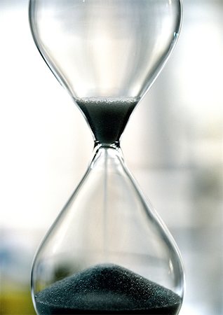 Hourglass, close-up Stock Photo - Premium Royalty-Free, Code: 695-03381078