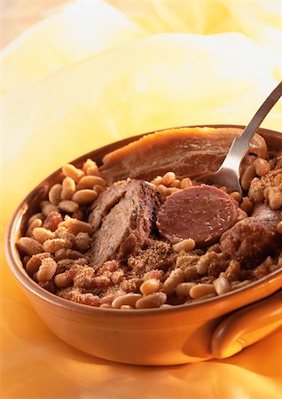 stew sausage - Cassoulet (french meat and bean stew) in casserole dish, close-up Stock Photo - Premium Royalty-Free, Code: 695-03381326