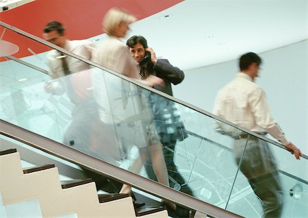 Business people on stairs, blurred Stock Photo - Premium Royalty-Free, Code: 695-03381633