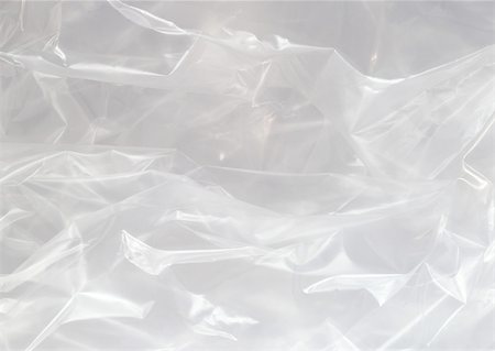 pvc - Wrinkled plastic wrap, extreme close-up Foto de stock - Sin royalties Premium, Código: 695-03381995